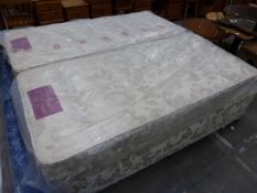 * A pair of single Divan Beds with mattresses (brown leaf pattern) (est £30-£50)