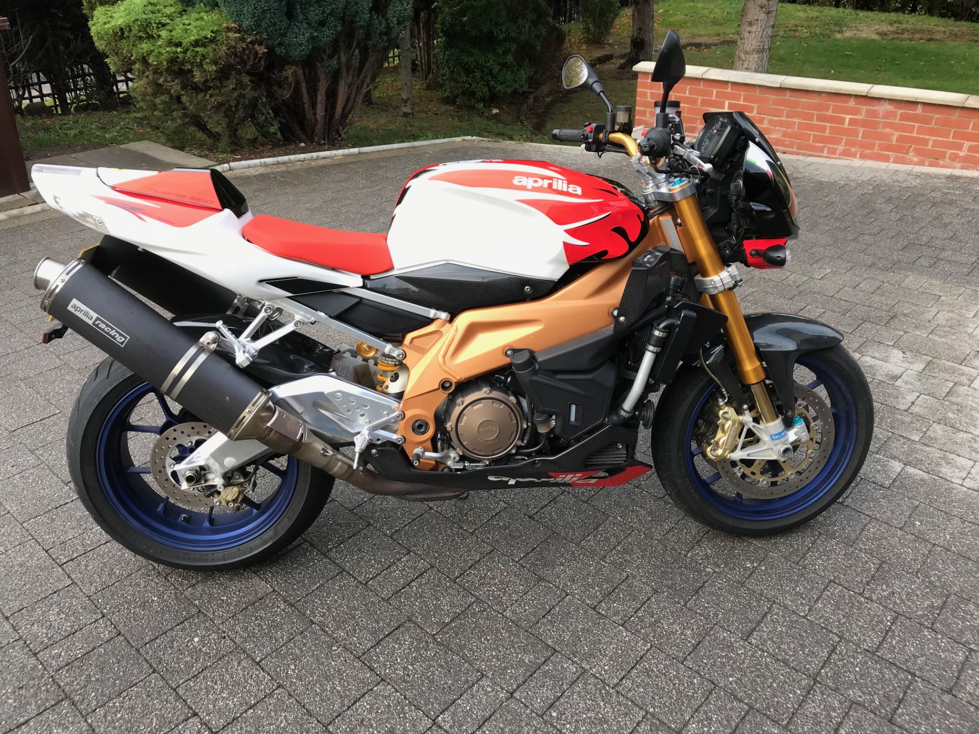 Aprilia Factory RSV Tuono 1000 Motorcycle, red / white, 2007 model which has covered 3,902 miles,