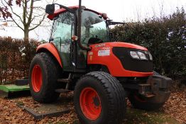 * 2012 Kubota 7040 4 x 4 Tractor c/w Pick up Hitch, Draw Bar Attachment, Ultragrand Cabin, Shuttle