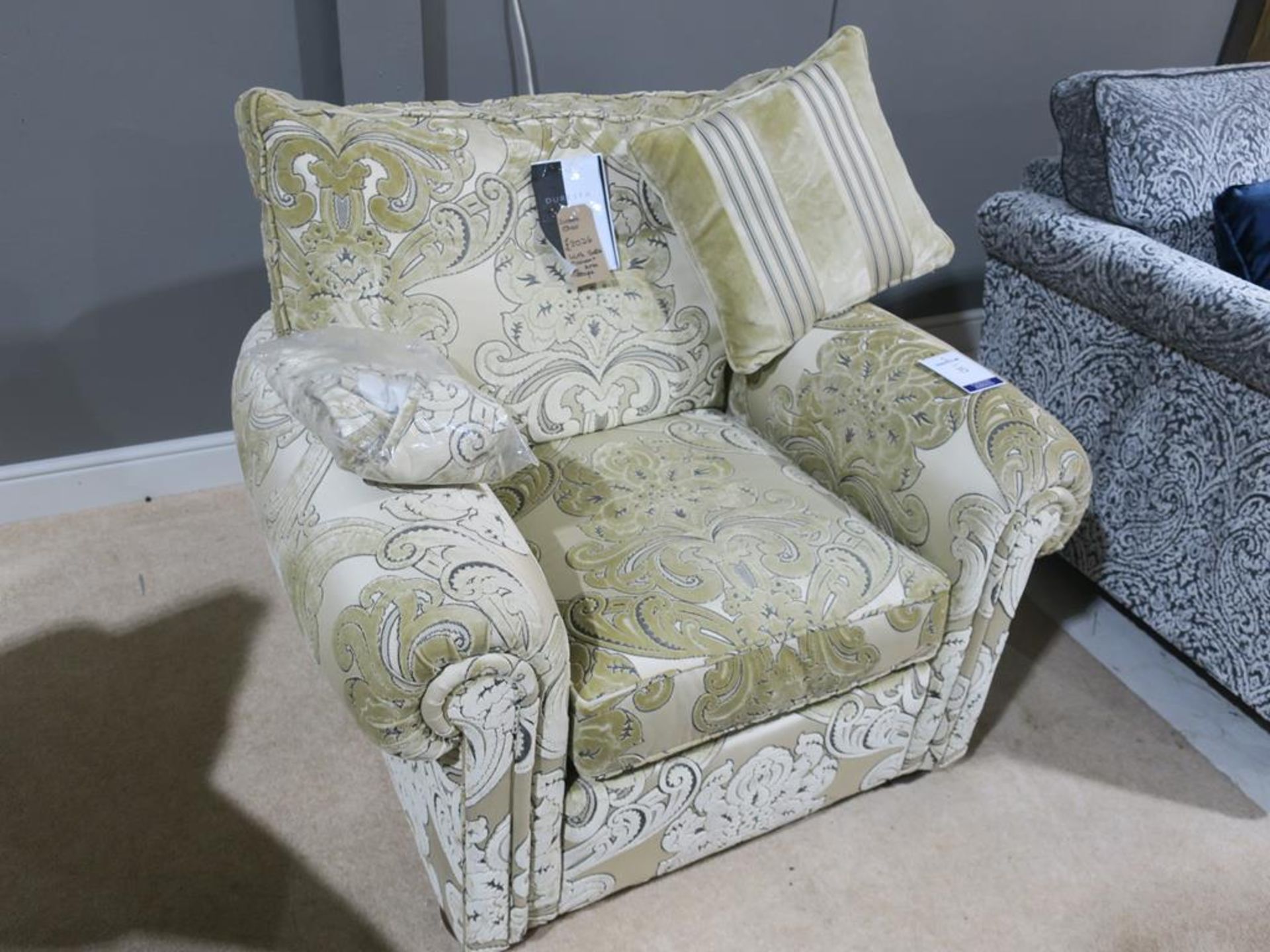 A Duresta Chair with Scatter Cushion and a pair of Arm Caps (width 110cm) (RRP £2026)