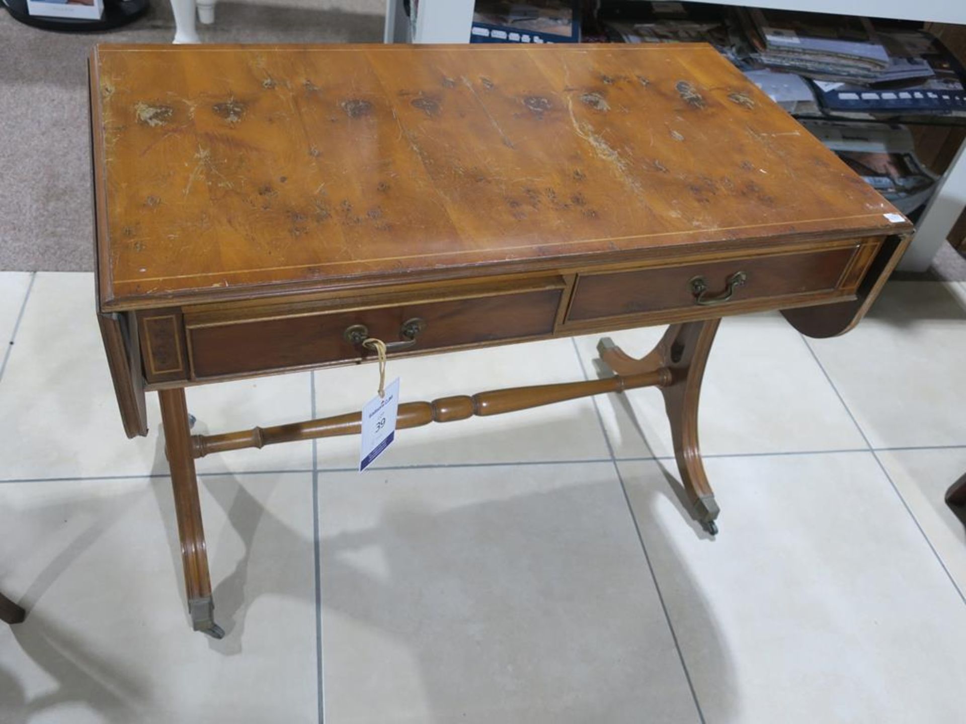 * A Drop Leaf Rectangular Table with two drawers with turned stretcher on metal castors (H 74cm, W - Image 4 of 7