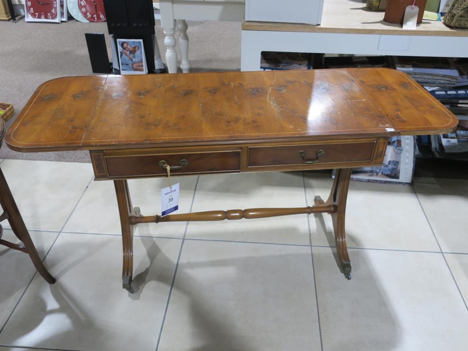 * A Drop Leaf Rectangular Table with two drawers with turned stretcher on metal castors (H 74cm, W - Image 5 of 7