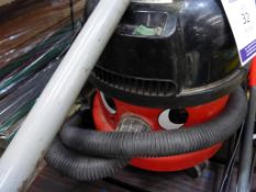 * A Henry Vacuum Cleaner together with another Vacuum