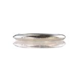 A contemporary platinum wedding band / ring apparently unmarked, plain with a bevelled edge. Ring