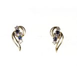 A pair of sapphire earrings in yellow gold set with alternating sapphires and white round cut