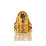 LALAOUNIS - A vintage ruby and sapphire dress ring by Ilias Lalaounis in 18ct yellow gold with a
