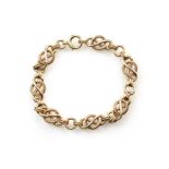 An antique gold bracelet in 9ct yellow gold formed of interlocking and rope twist links. Length 20cm