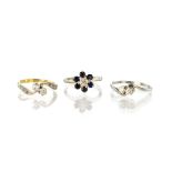 Three antique diamond rings in 18ct gold and platinum two designed as two-stone crossover 'toi et