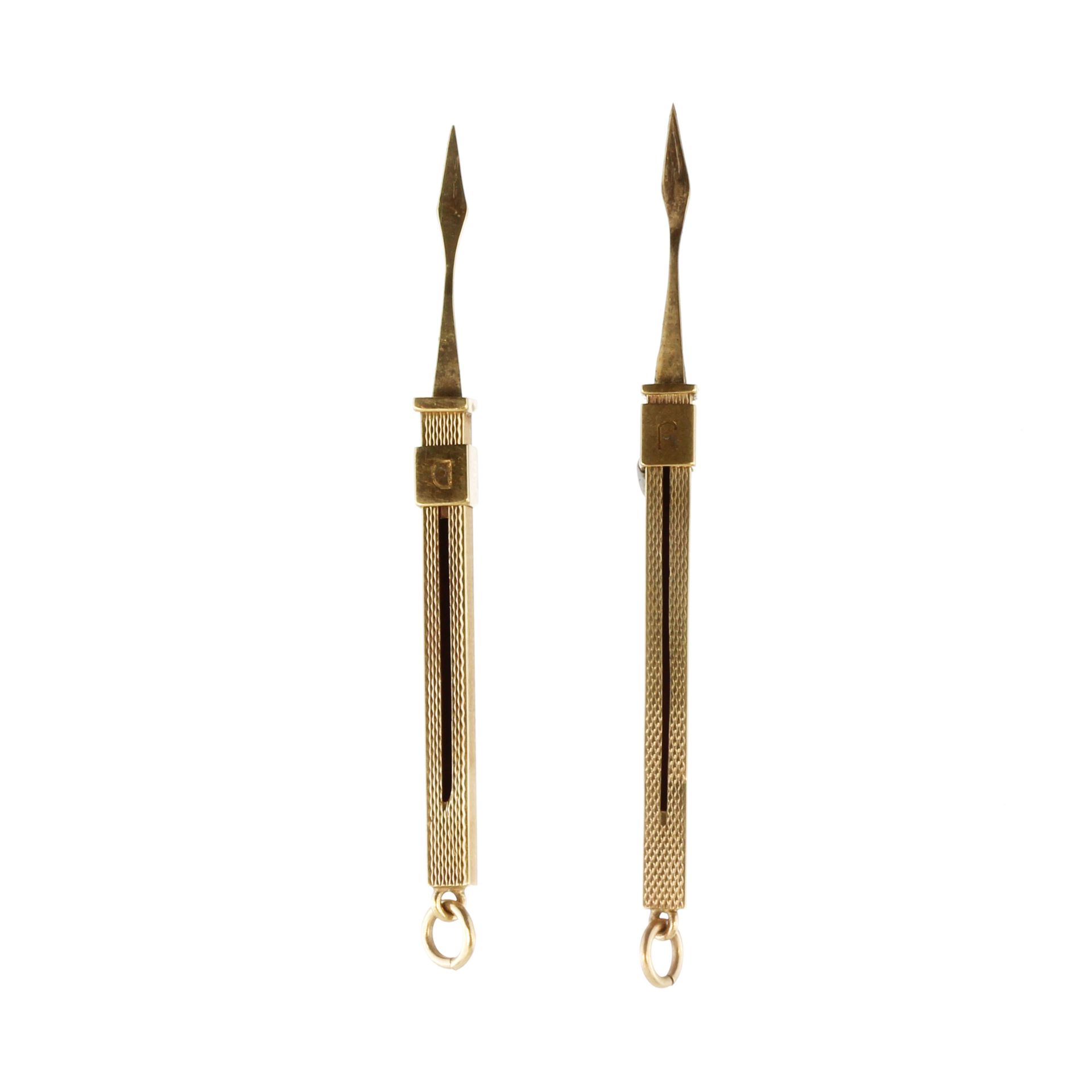 Two 9ct gold extendable toothpicks the squared bodies with engine turned decoration, the sliding