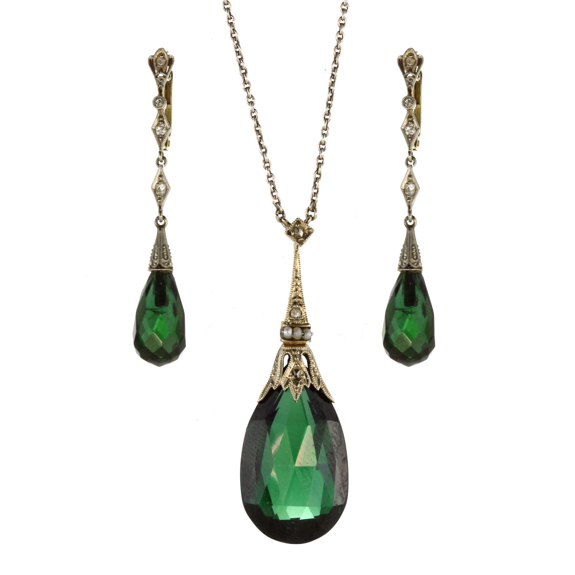 A green tourmaline and diamond necklace and earrings set in 14ct gold each piece designed as a