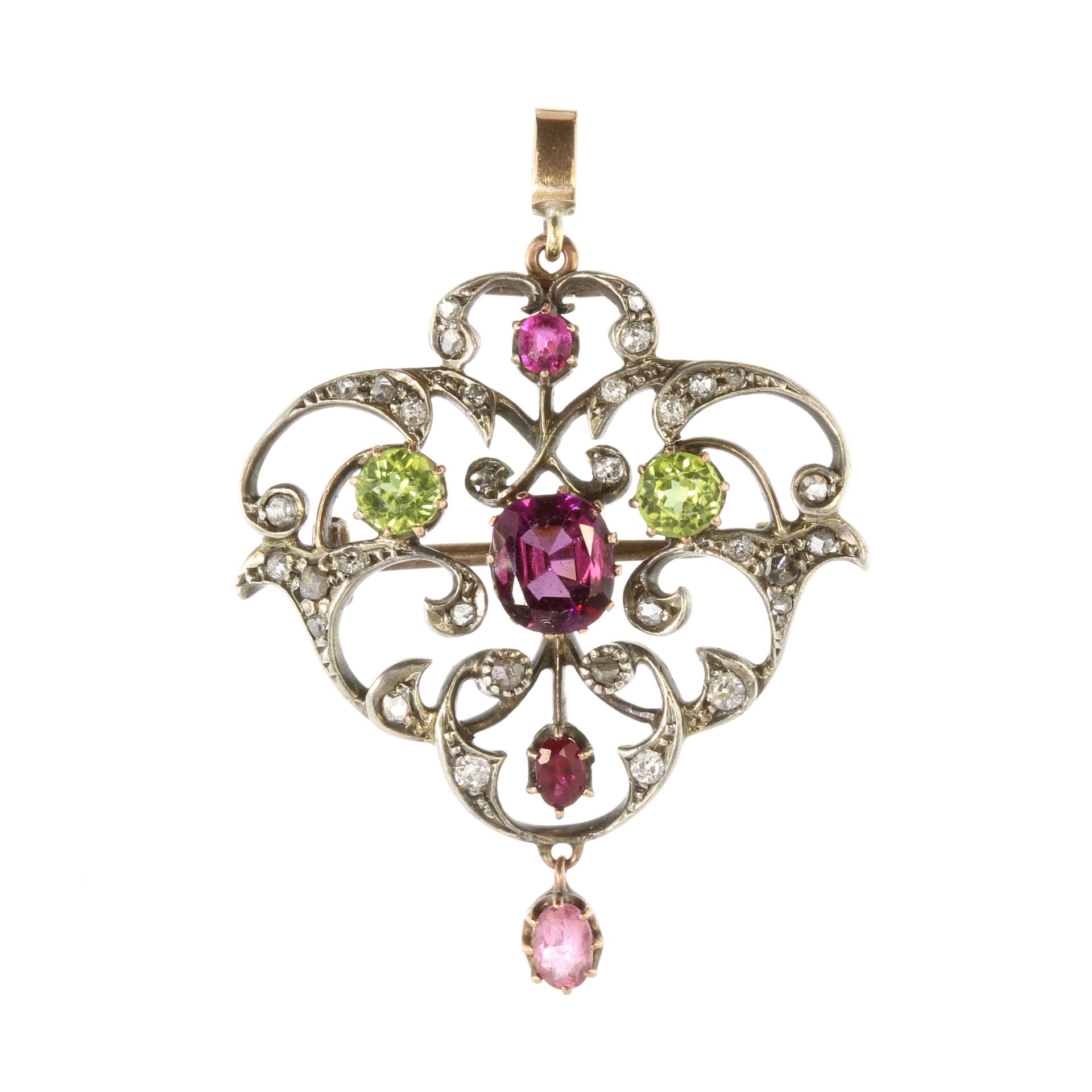 An antique Victorian garnet, peridot and diamond pendant in yellow gold designed as a belle epoque