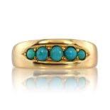 An antique turquoise five stone dress ring in 15ct yellow gold designed as five graduated