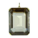 A large Vintage smoky quartz / cairngorm pendant in 18ct yellow gold set with a large modified