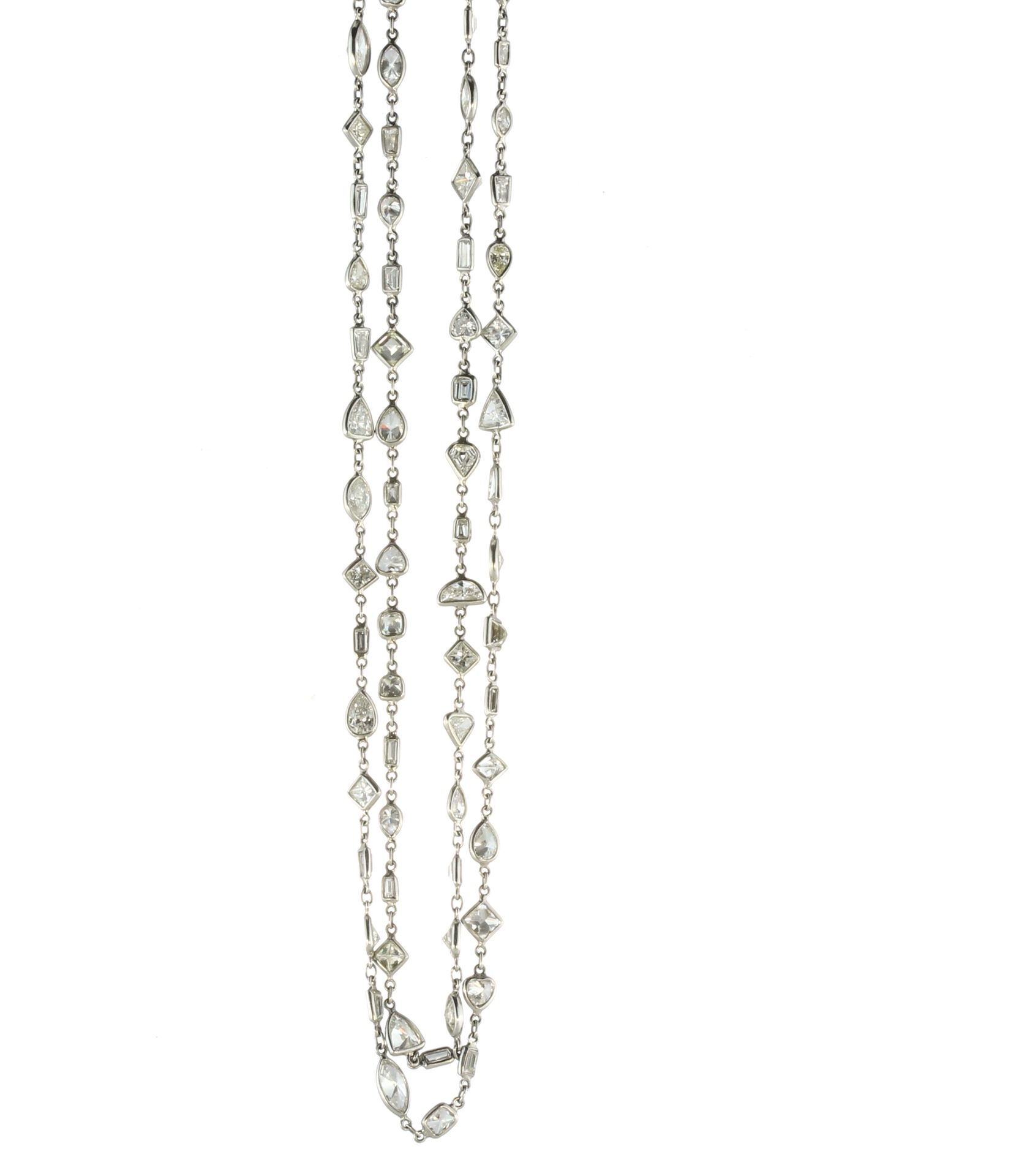 A fancy cut 21.8ct diamond longchain necklace in platinum, designed as a single chain set with