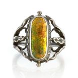 An antique Arts & Crafts enamel and sterling silver ring by the Guild of Handicrafts set with an