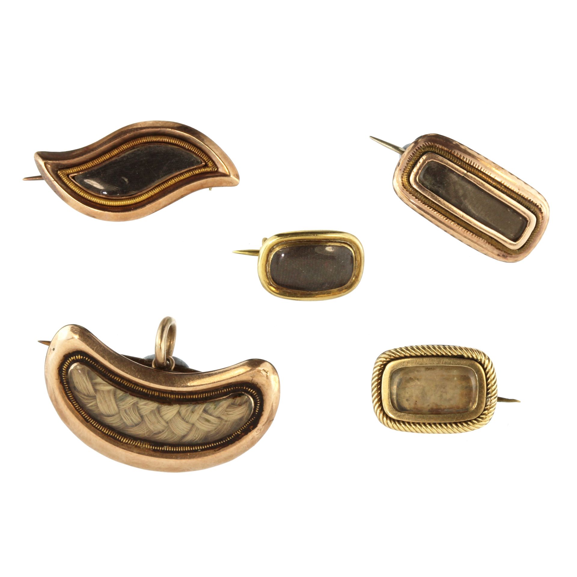 Five antique Georgian hairwork mourning brooches in yellow gold one of kidney form with an inset