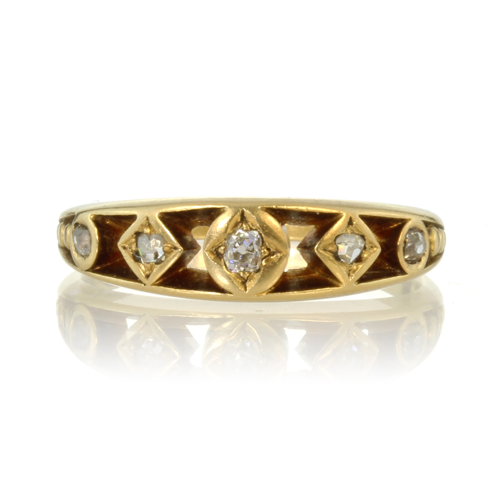 An antique Georgian five stone diamond ring in high carat yellow gold set with five graduated old