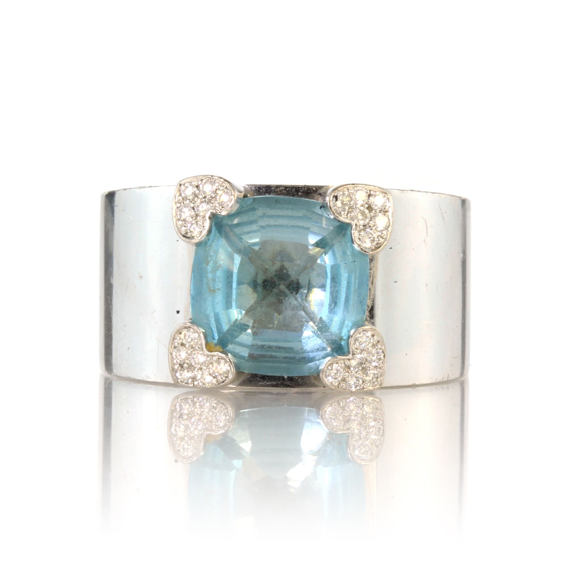 CHOPARD An aquamarine and diamond dress ring in 18ct white gold by Chopard designed as a central