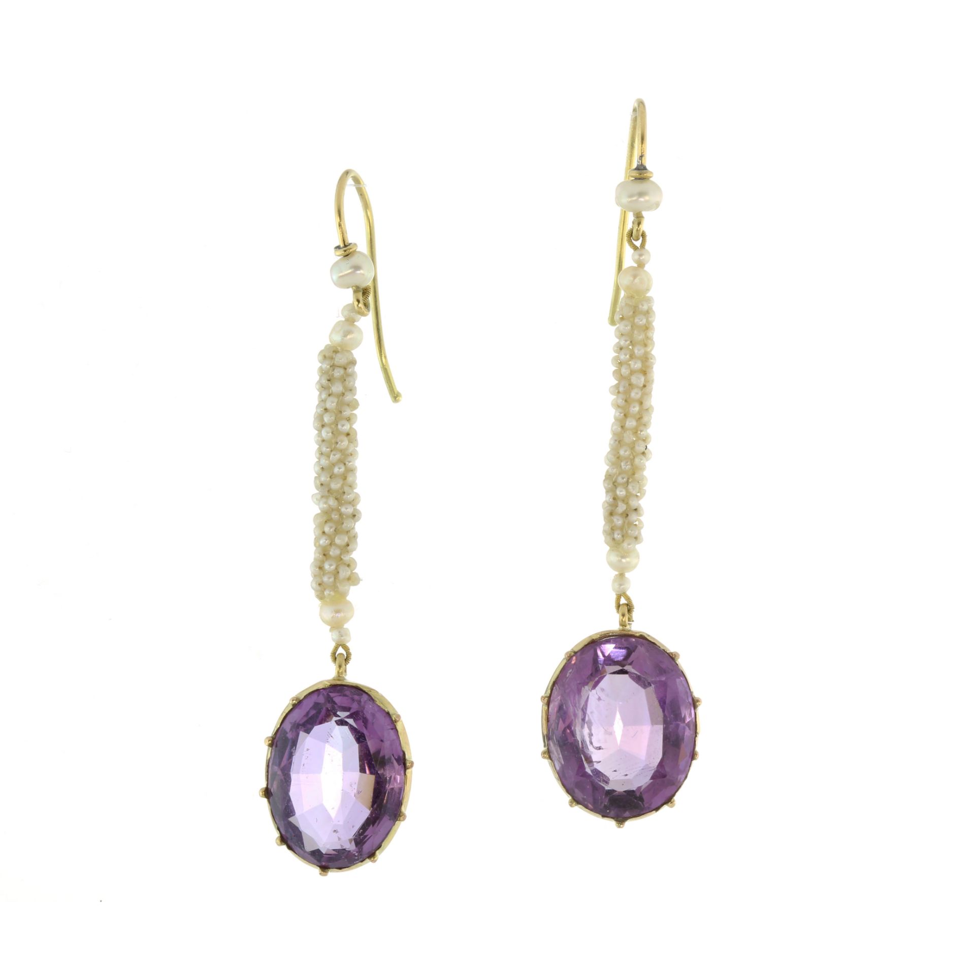 A pair of antique Georgian amethyst and seed pearl drop earrings each set with an oval cut