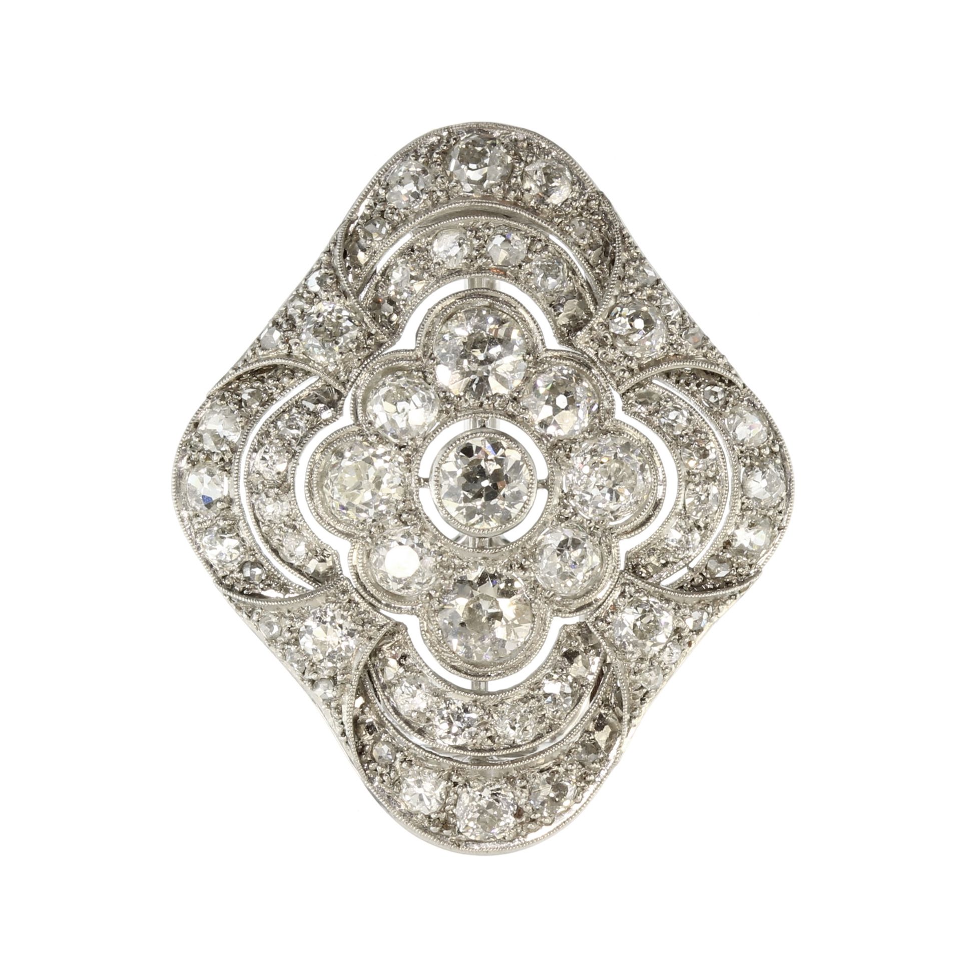 An antique Art Deco diamond scarf clip in 18ct white gold set with a central old round cut diamond