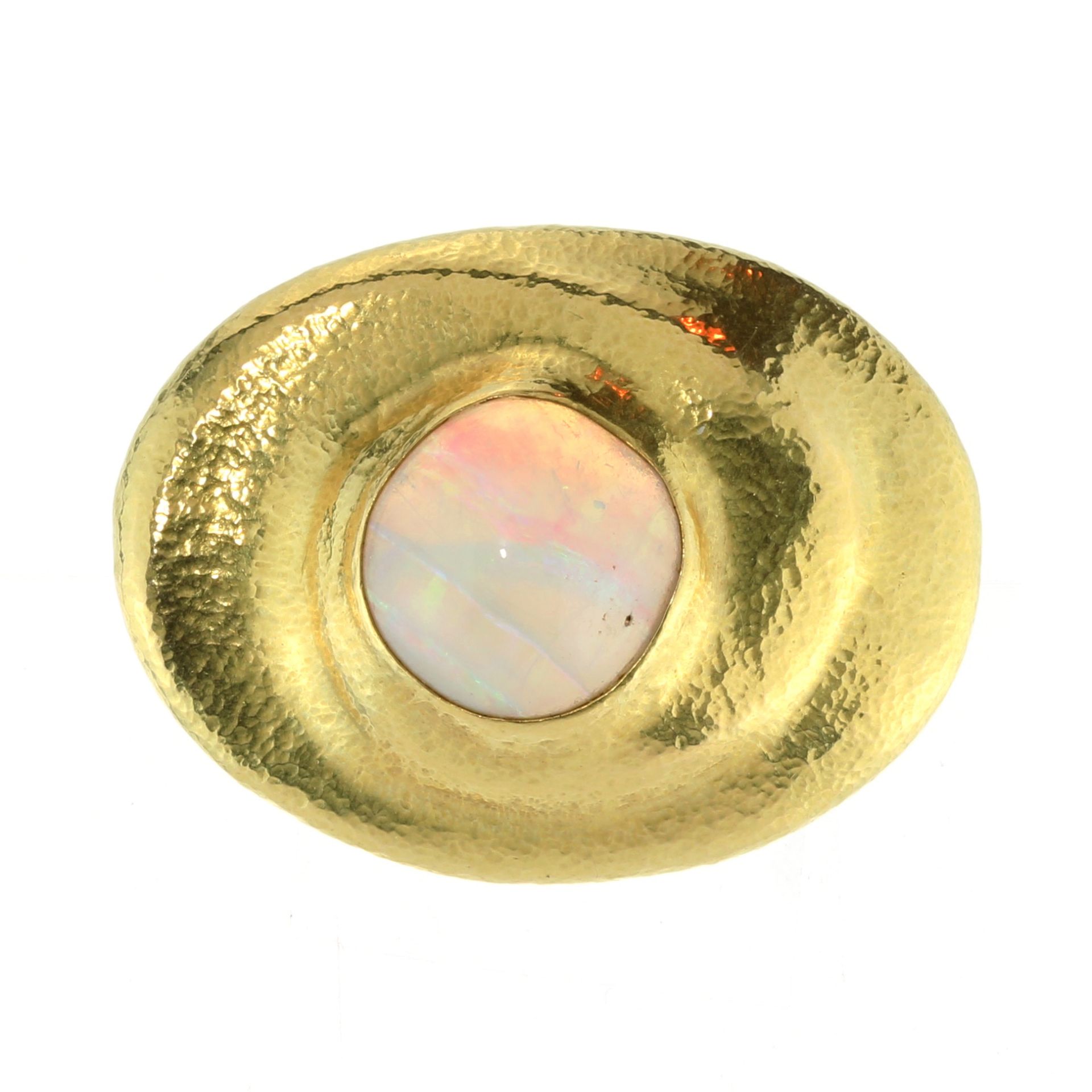 A vintage opal and diamond brooch in 18ct yellow gold signed PK, designed as a large cabochon cut