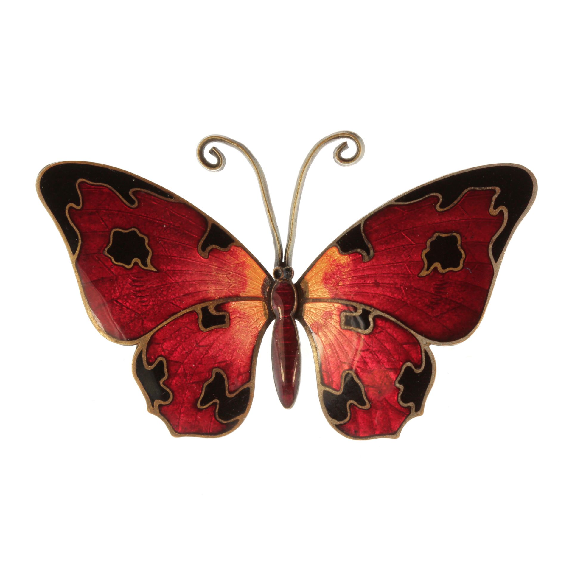 An antique enamel butterfly brooch the body and wings decorated in various shades of red and black