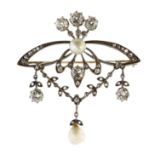 An antique Belle Epoque natural pearl and diamond brooch in gold and silver or platinum, set with