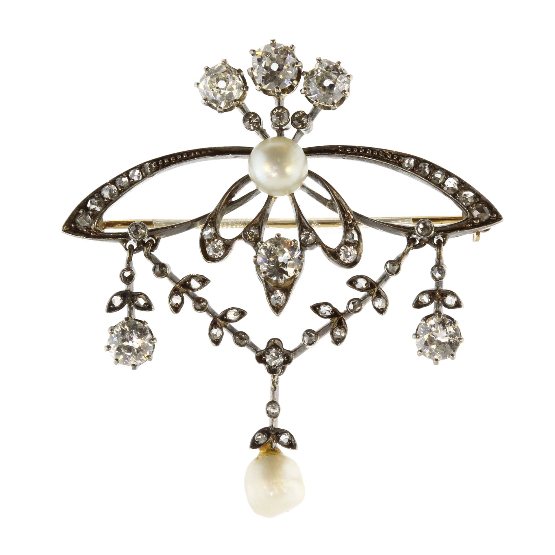 An antique Belle Epoque natural pearl and diamond brooch in gold and silver or platinum, set with