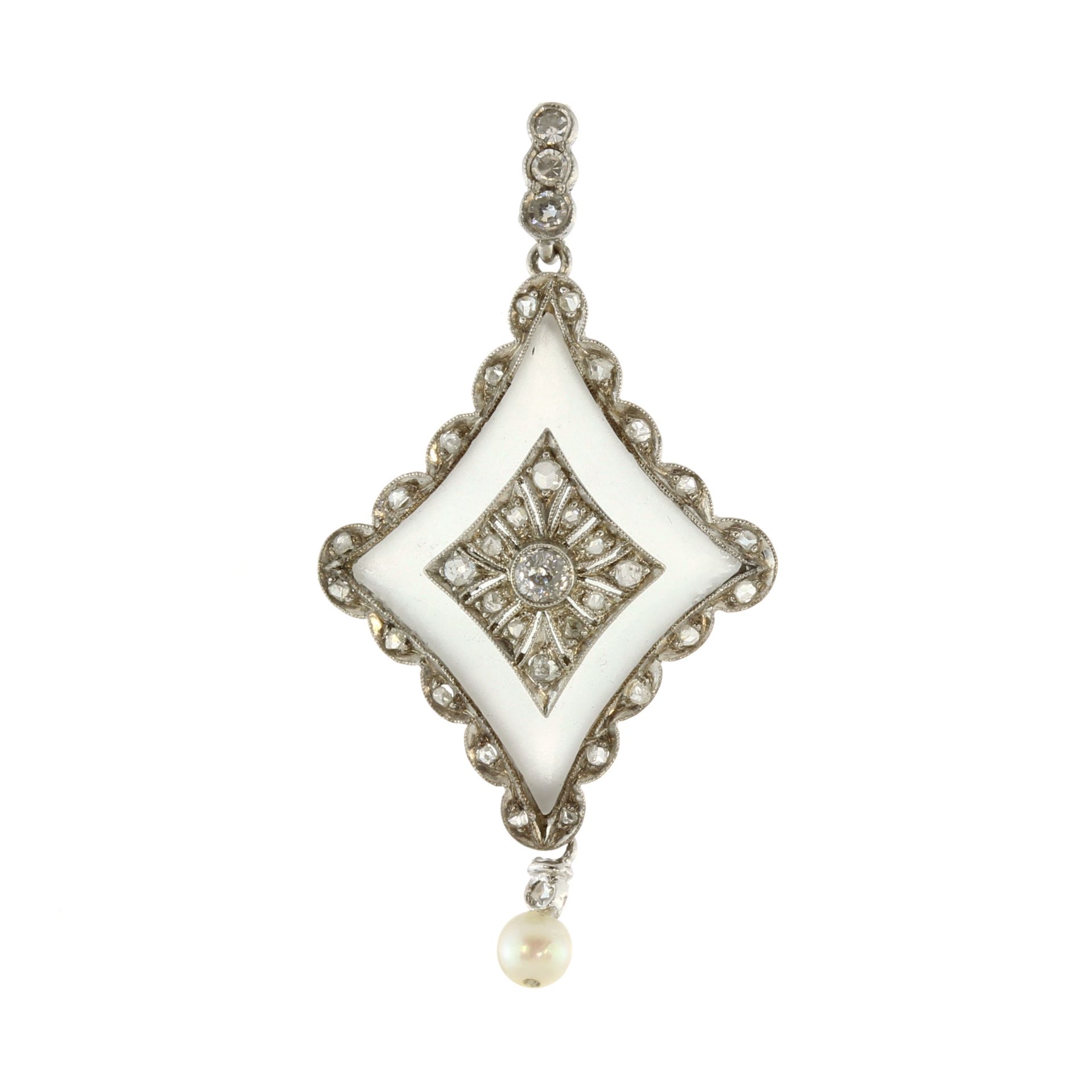 A vintage rock crystal, diamond and pearl pendant in white gold or platinum, the central diamond