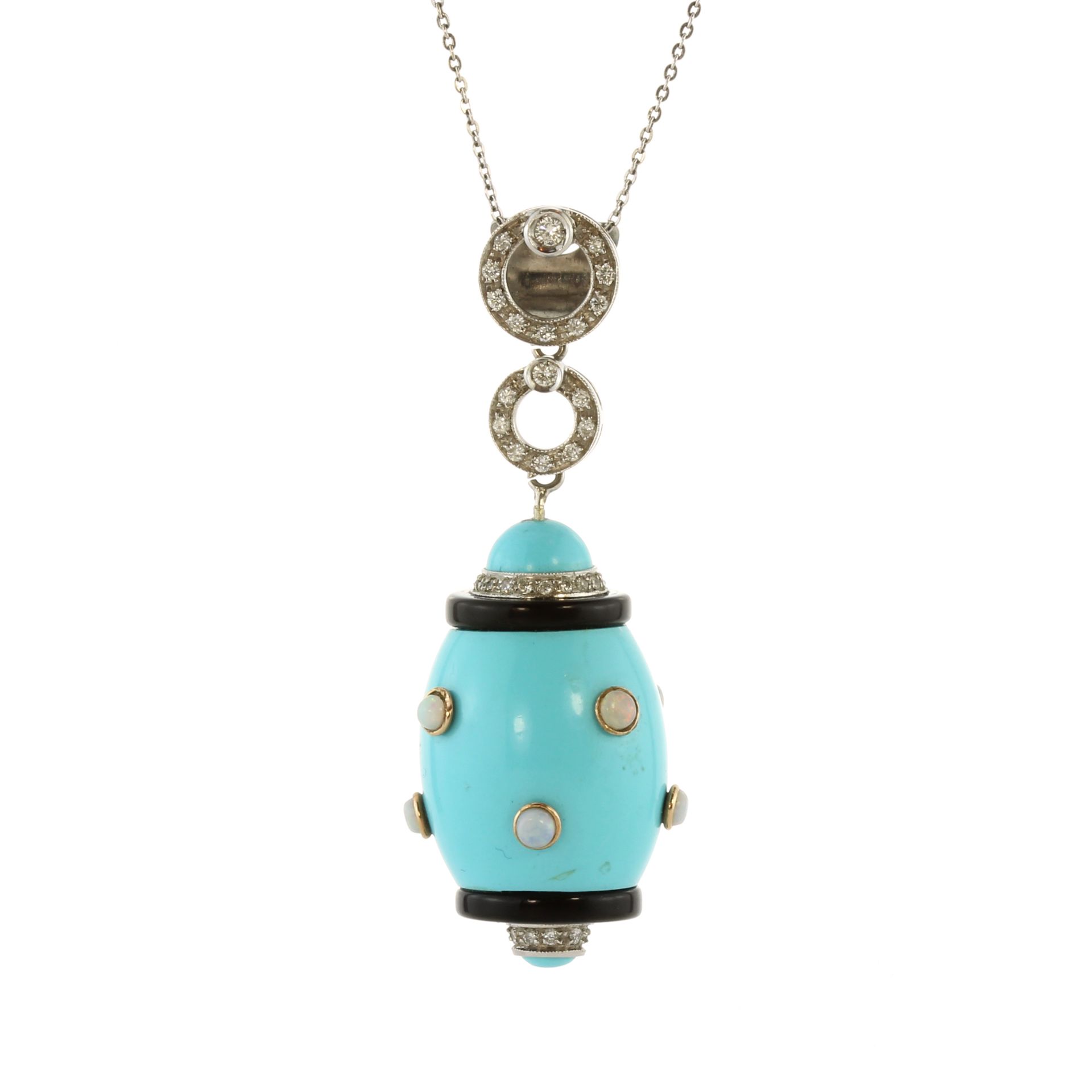 A vintage turquoise, opal, diamond and onyx pendant and chain in 18ct white gold, the large,