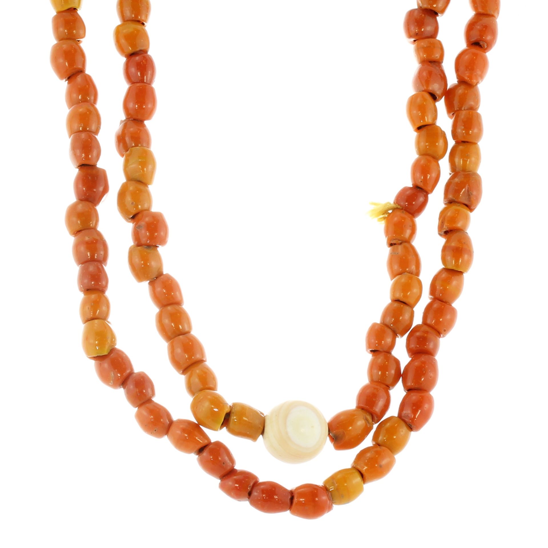 Five amber bead necklaces together with a white metal necklace, the amber necklaces each
