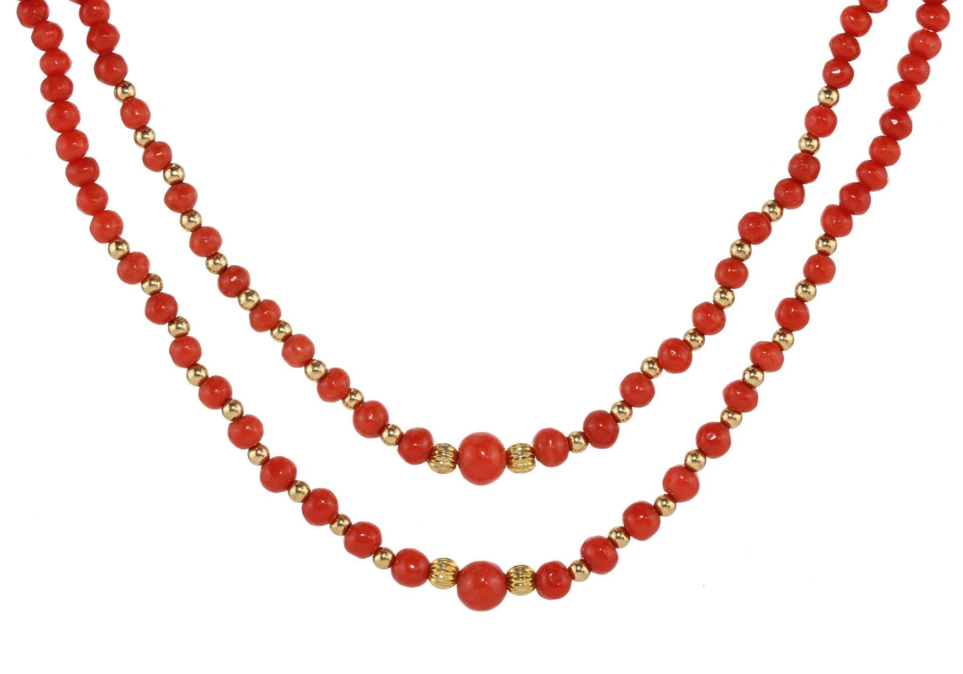 A double row coral and gold bead necklace in yellow gold designed as two rows of two hundred and
