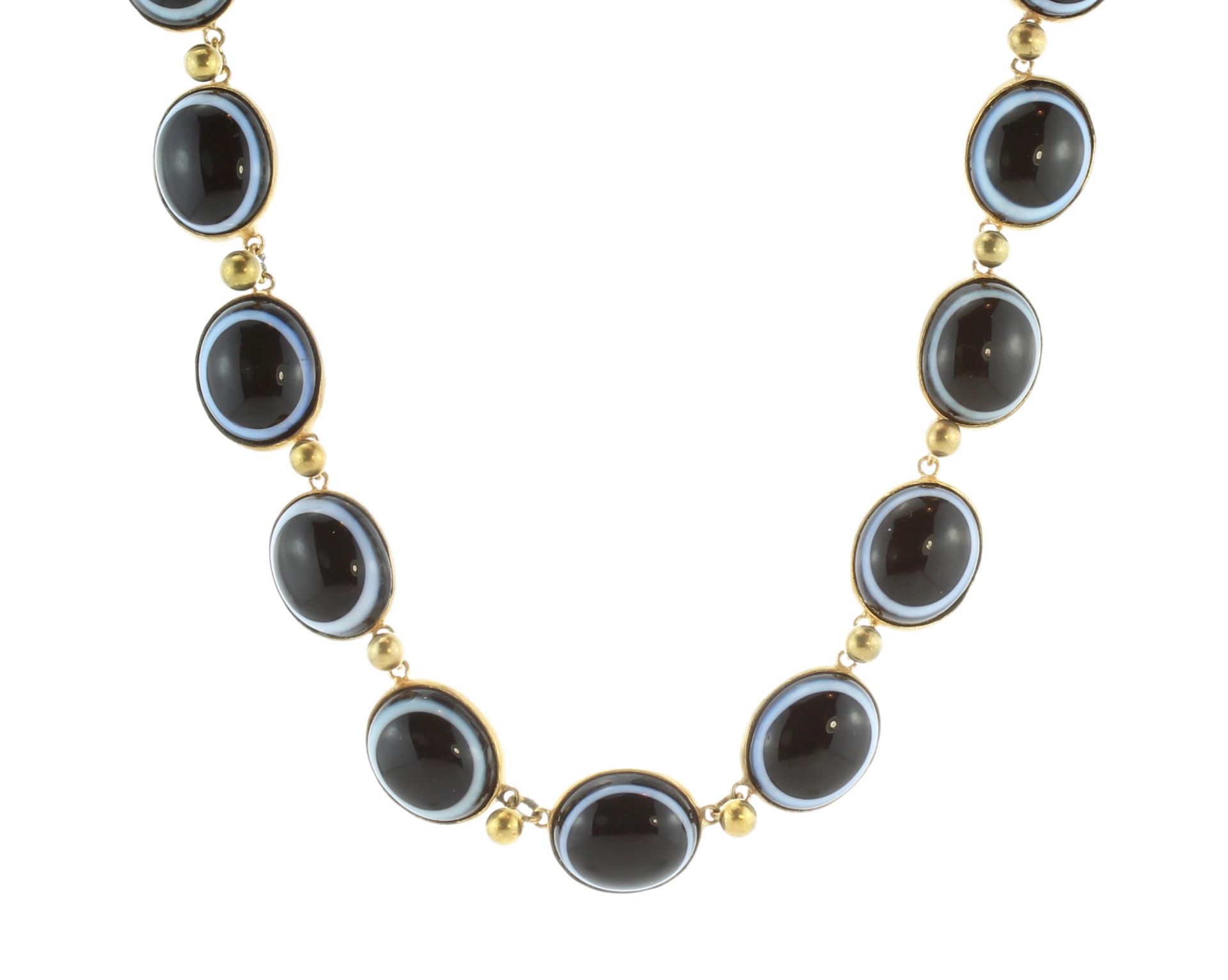 An antique 19th Century banded agate necklace in yellow metal designed as a single row of fifteen