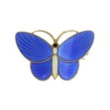 An antique Norwegian enamel butterfly brooch in sterling silver designed as a butterfly, with blue