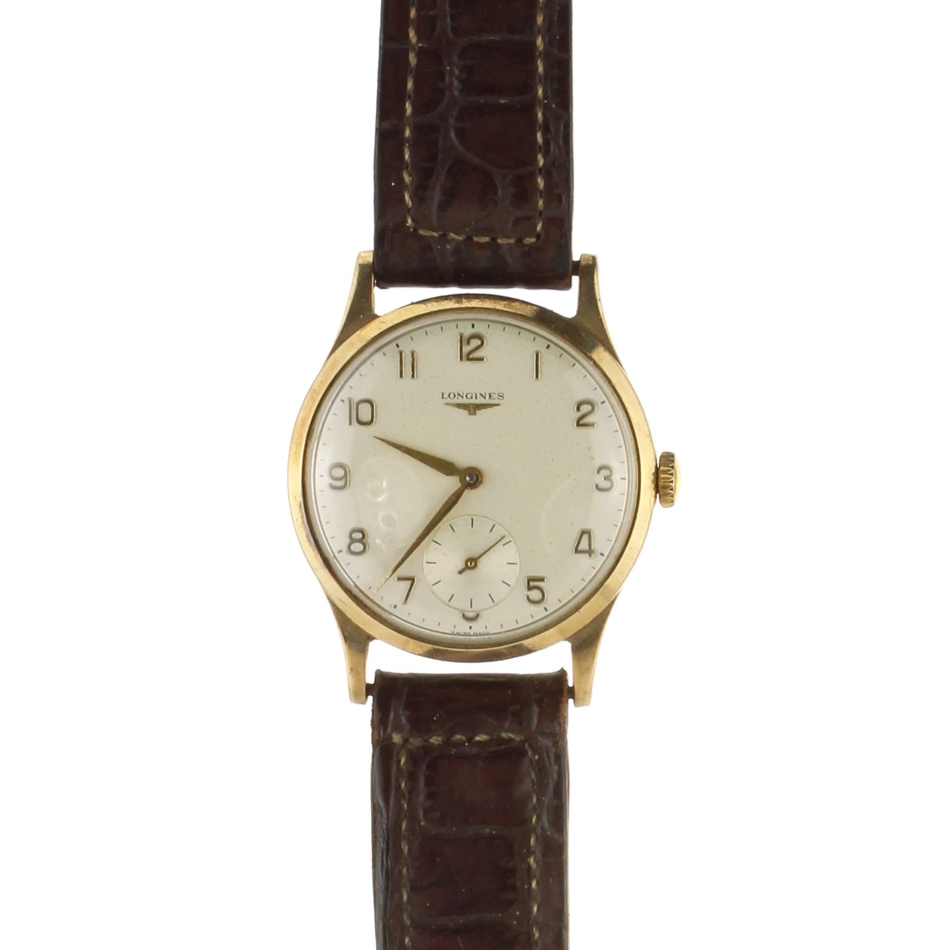 LONGINES A 9ct yellow gold wristwatch by Longines on a leather strap.