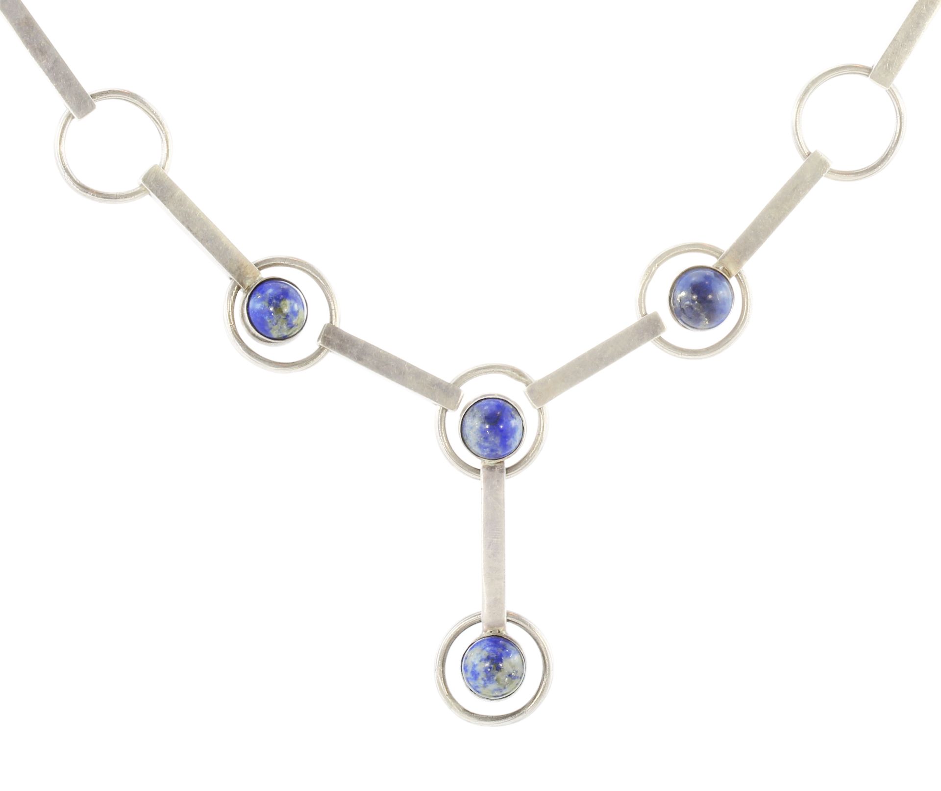 A vintage lapis lazuli necklace in sterling silver circa 1975 designed as alternating circular and