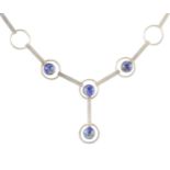 A vintage lapis lazuli necklace in sterling silver circa 1975 designed as alternating circular and