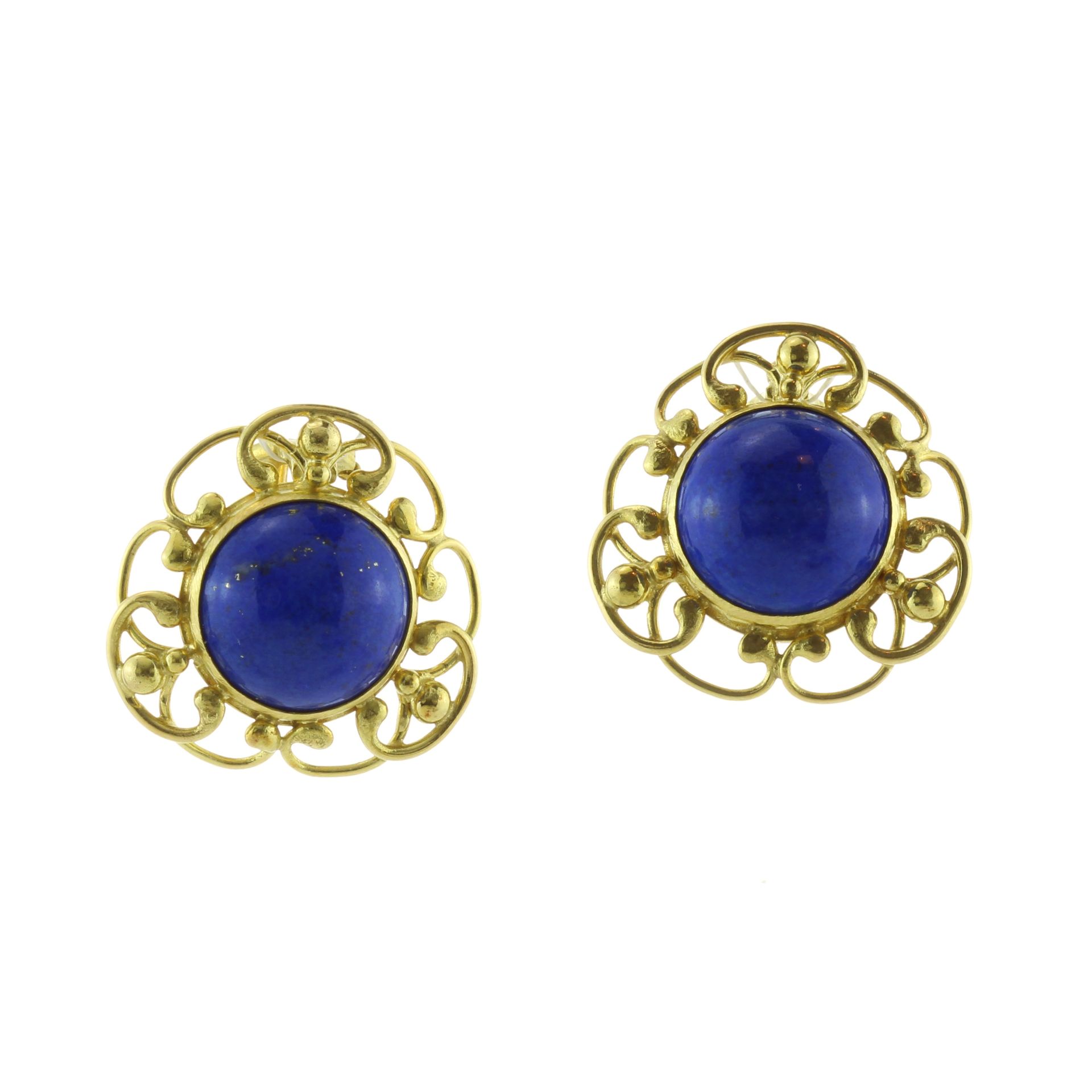 A pair of vintage lapis lazuli earrings in 18ct yellow gold each set with a circular lapis lazuli
