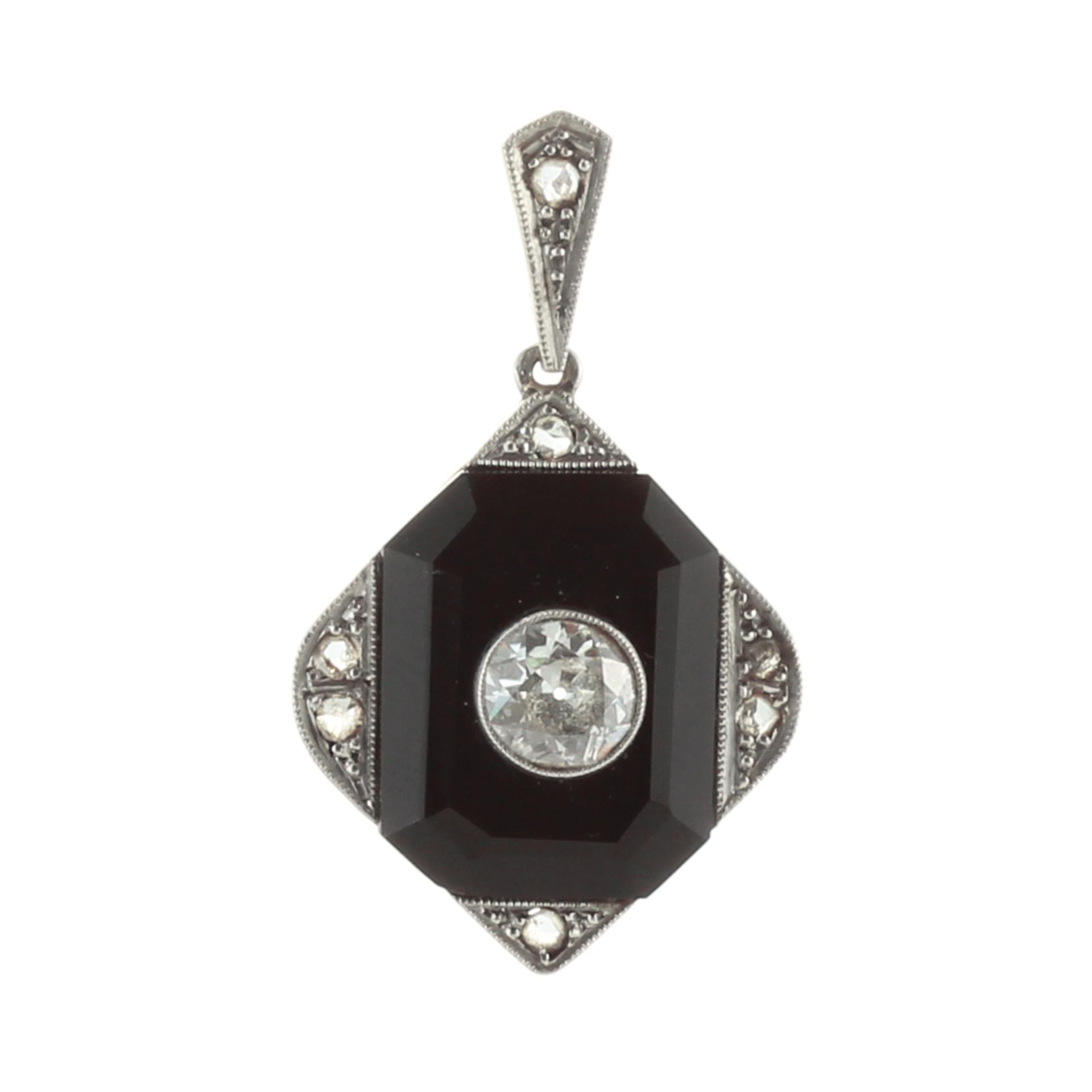 An antique French Art Deco diamond and onyx pendant in gold and platinum set with a carved octagonal