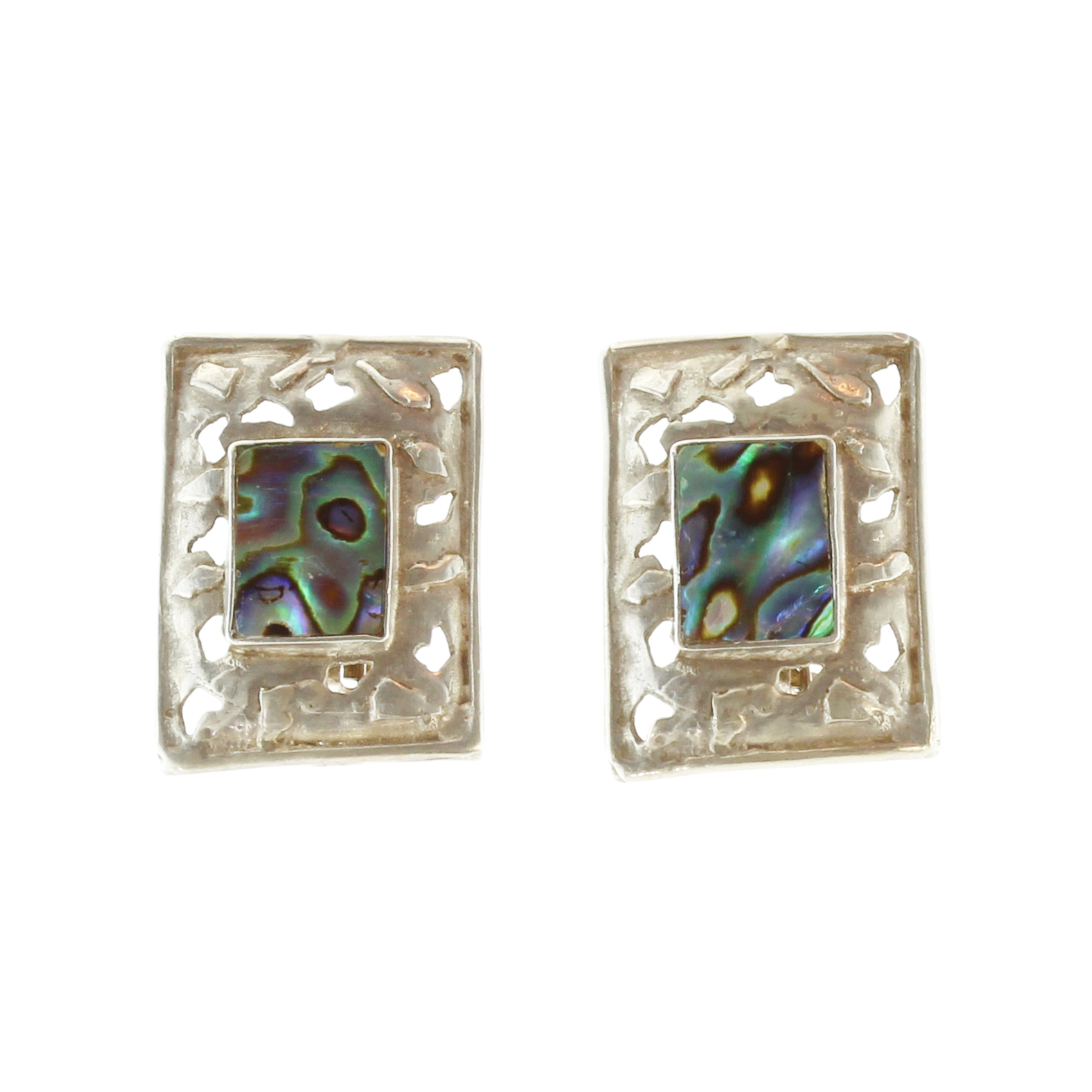 A vintage pair of mother of pearl / abalone clip earrings in silver each designed as a rectangular