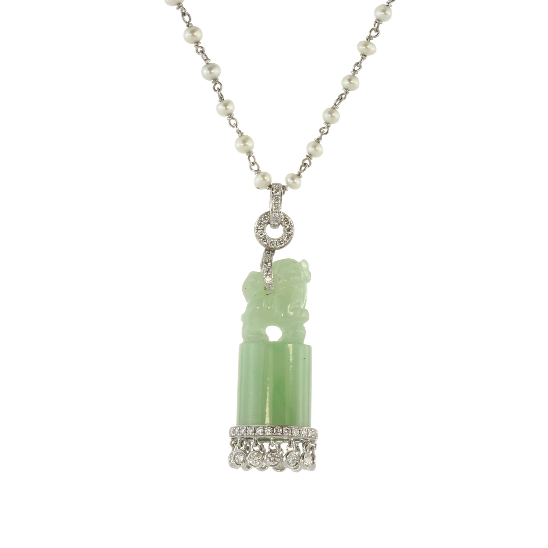 A Chinese jade seal and diamond pendant on a pearl chain in white gold, designed as a Chinese jade