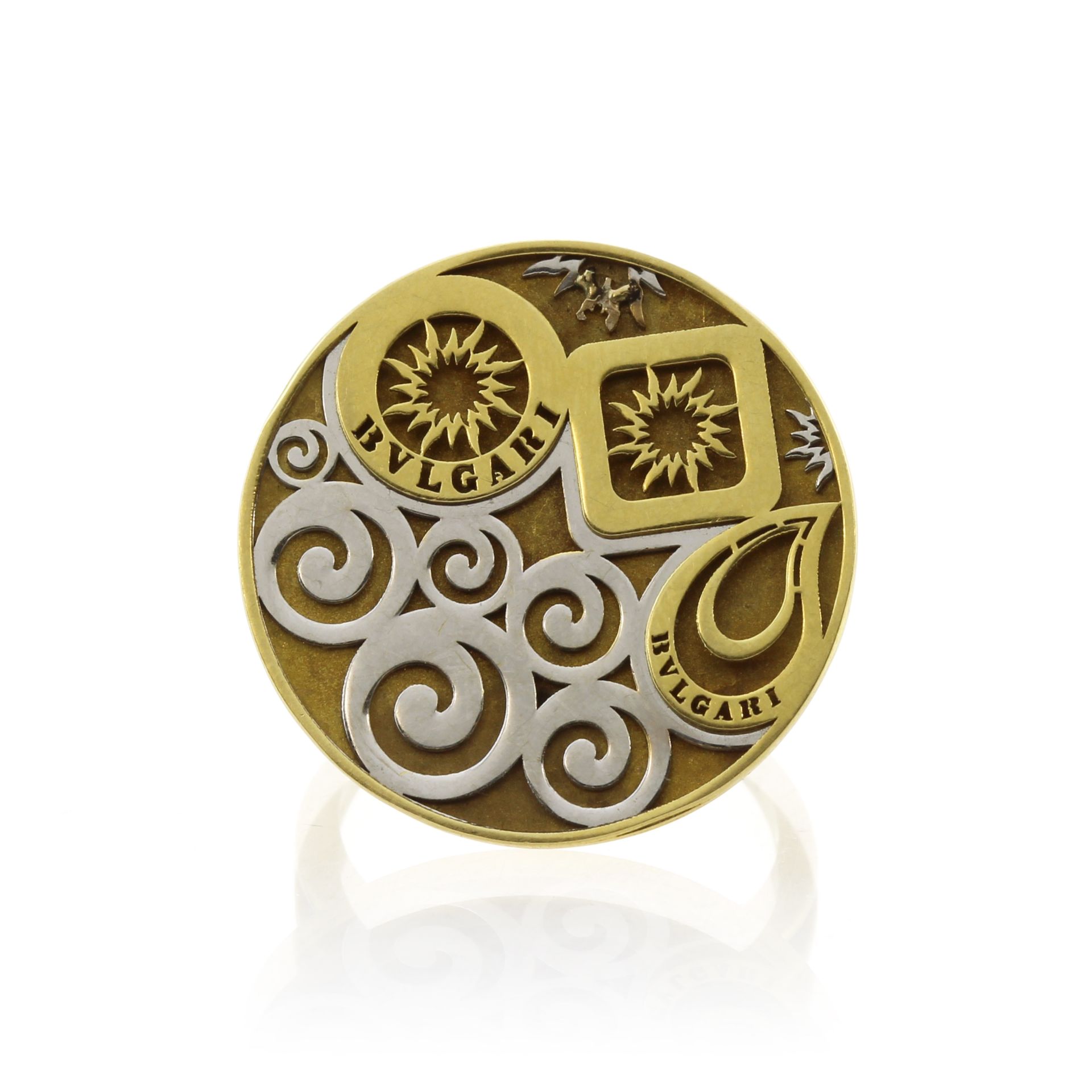 BULGARI A vintage dress ring by Bulgari in 18ct yellow and white gold, the large circular face
