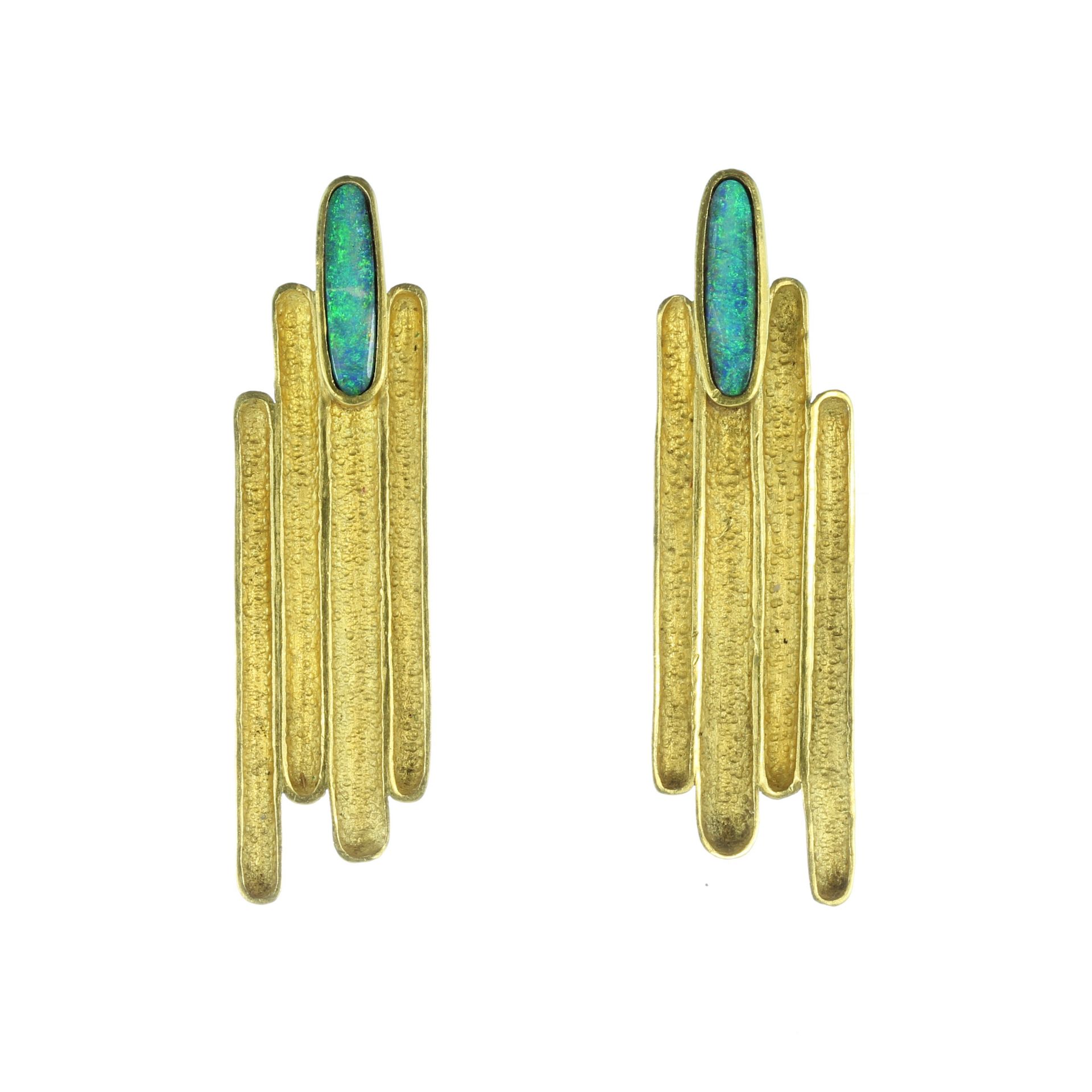 An pair of vintage opal clip earrings in 18ct yellow gold with French assay marks, each designed