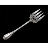 An antique Victorian Sterling Silver Grecian pattern meat fork by George Adams, London 1870.