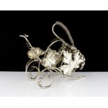 A vintage Italian 800 Silver wine bottle holder circa 1960. The wirework carriage body with