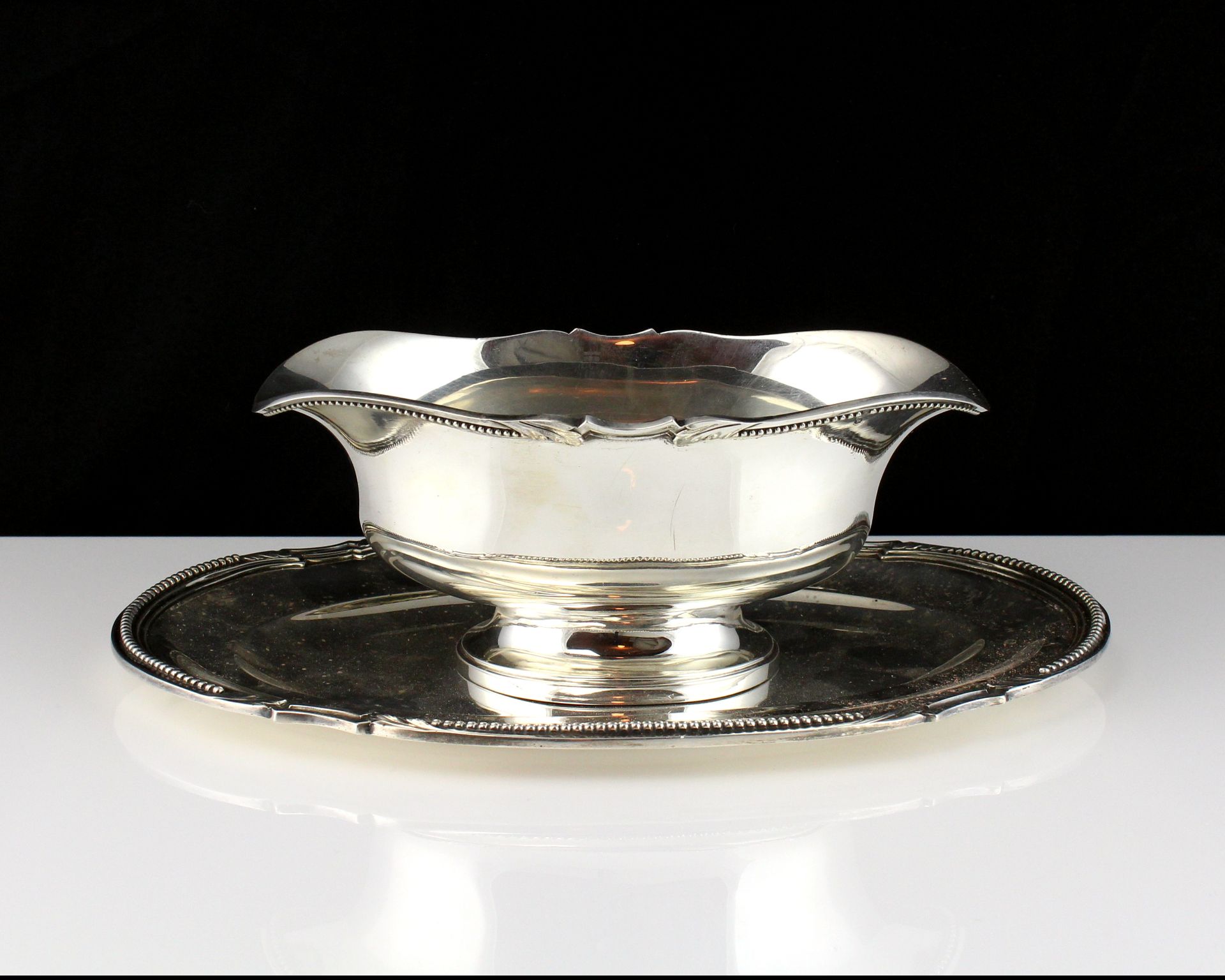 An antique French Silver sauce tureen by la Société Parisienne d'orfèvrerie circa 1910 the navette