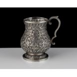 An antique Indian Silver cup / mug Kutch circa 1890 of baluster form on a spreading foot with