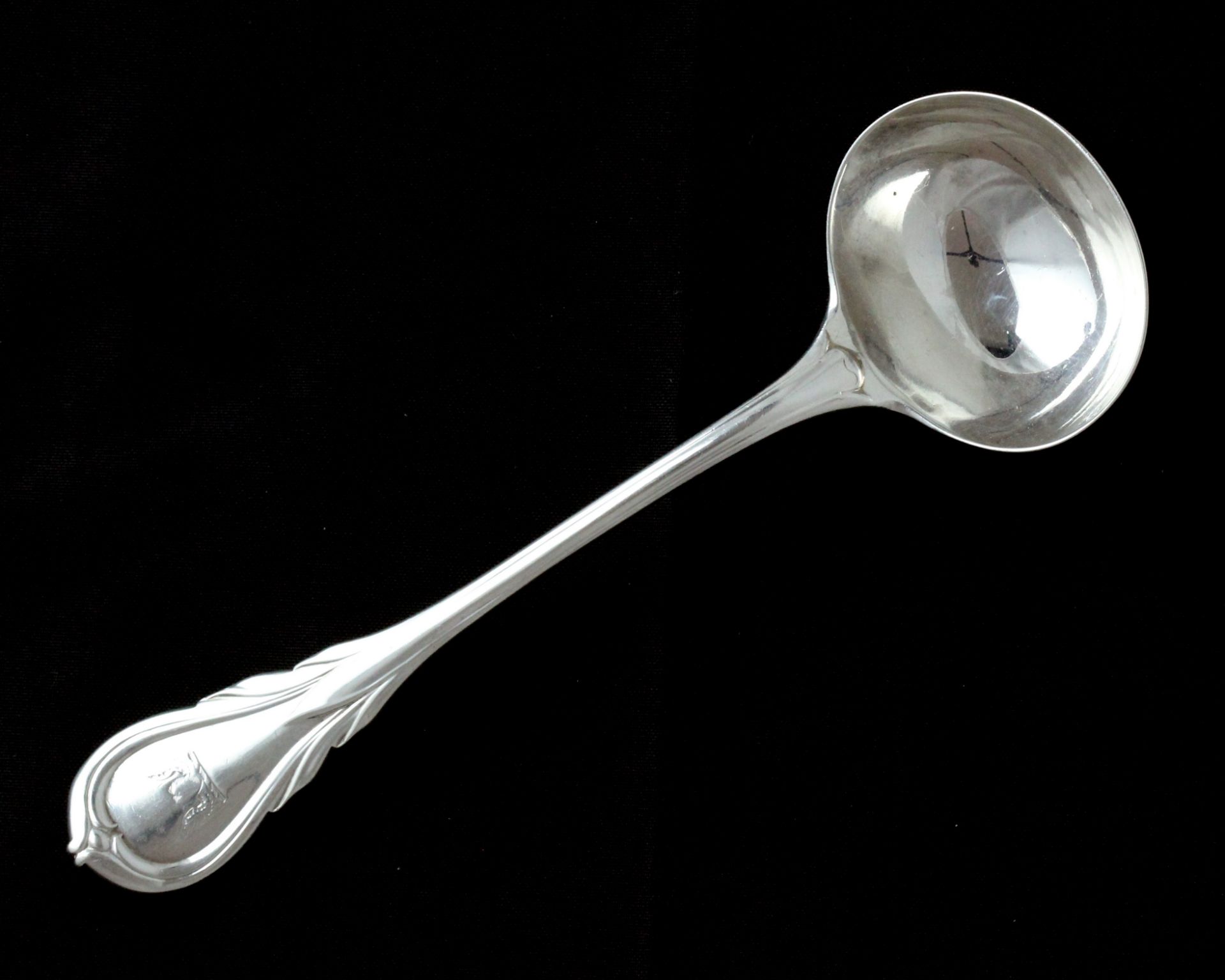 An antique Victorian Sterling Silver Lily pattern soup ladle by George Adam, London 1859. Length