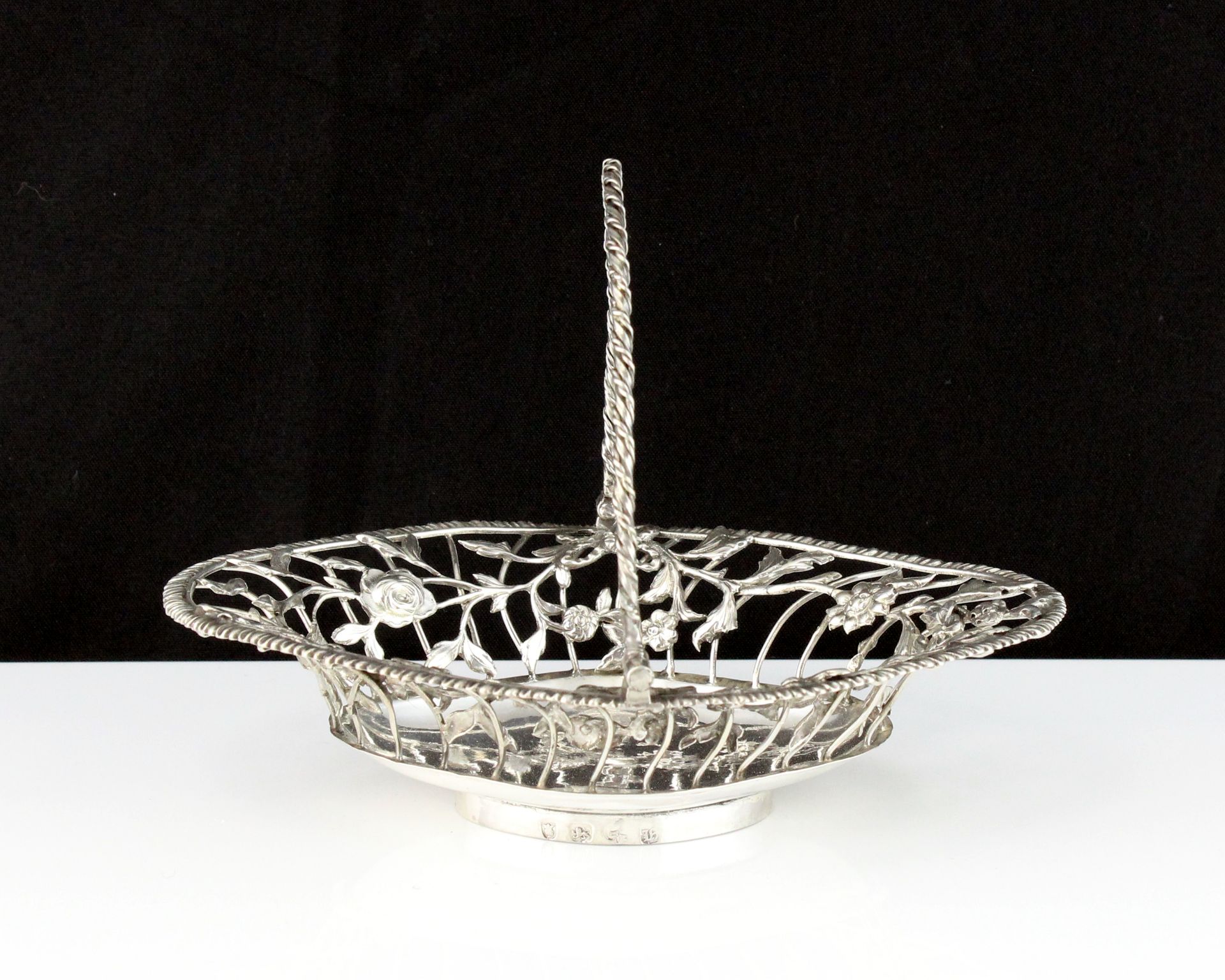 An antique George III Sterling Silver bon bon basket by Lutwyche & Vere, London, 1763 of navette