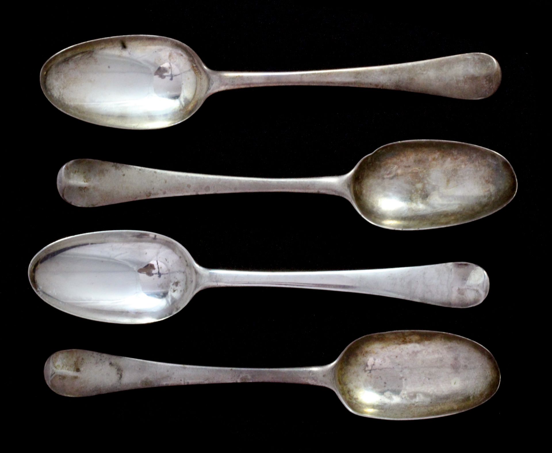 A set of four antique George II Sterling Silver tablespoons by Thomas Whipham, London 1746 in